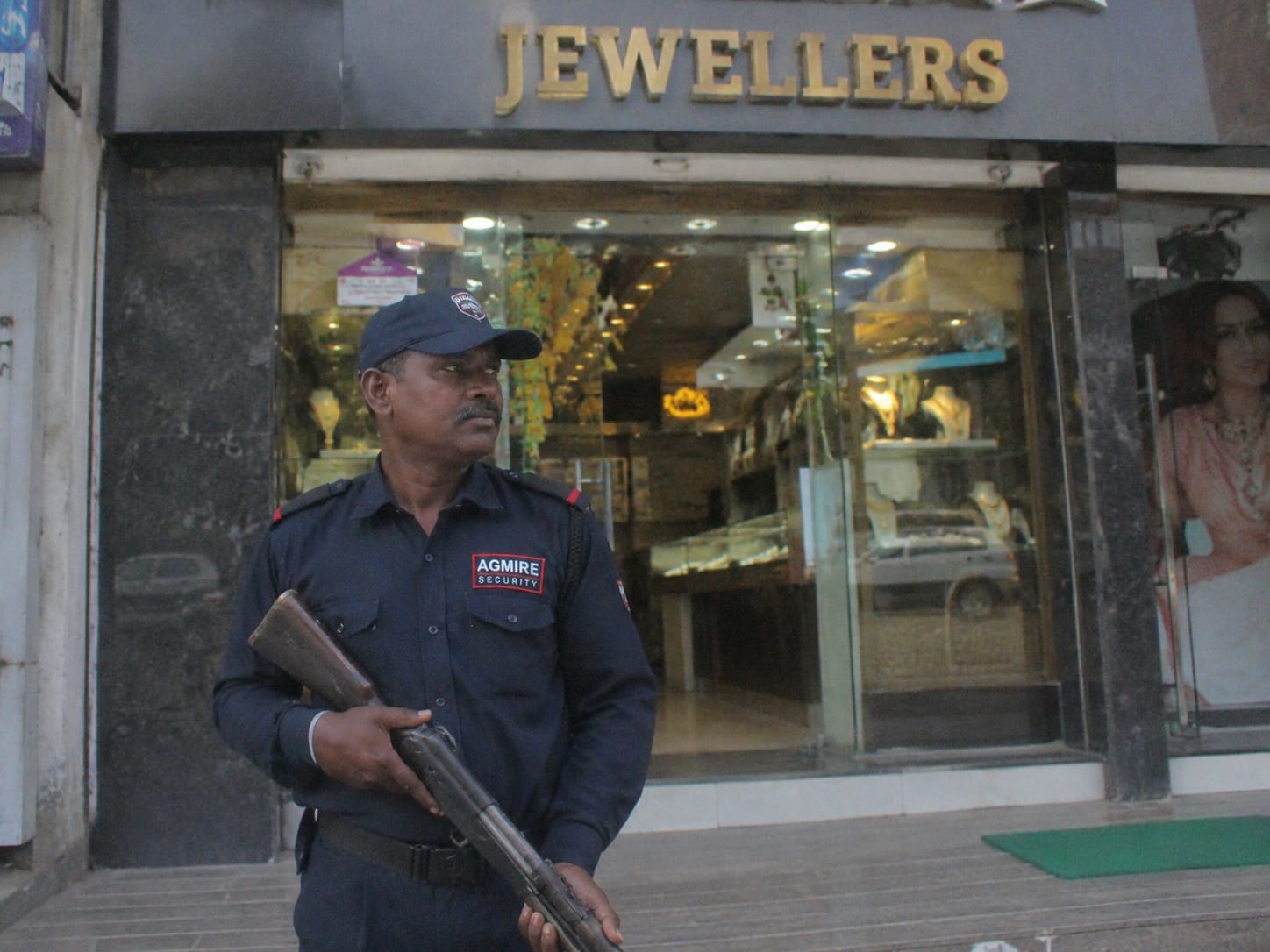 Armed security guard outside a jewellery store